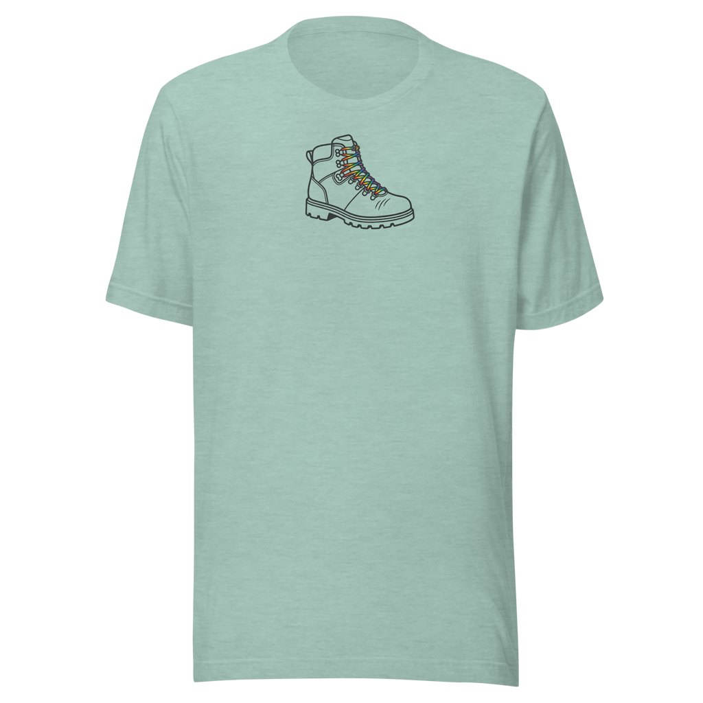 Minimalist Hiking boot silhouette with rainbow laces, upper center chest on Bella + Canvas heather prism dusty blue unisex tshirt.