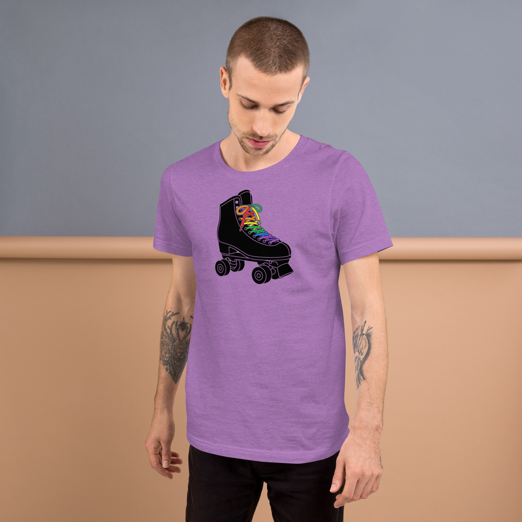 Person wearing black roller skate graphic with rainbow laces printed on heather team purple unisex Bella + Canvas tee. Paired with jeans