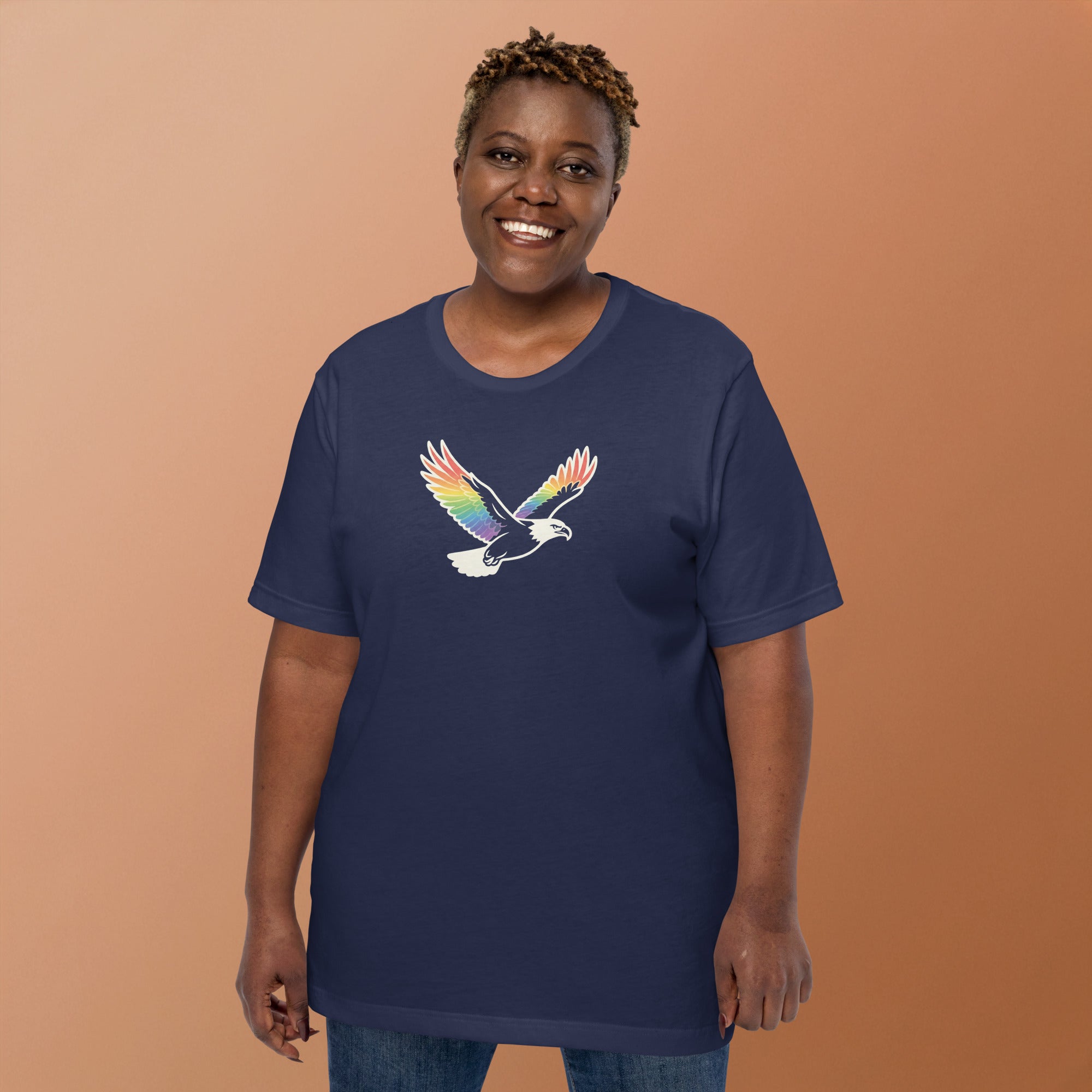 Person wearing rainbow flying eagle tshirt printed on Bella + Canvas unisex navy cotton tshirt