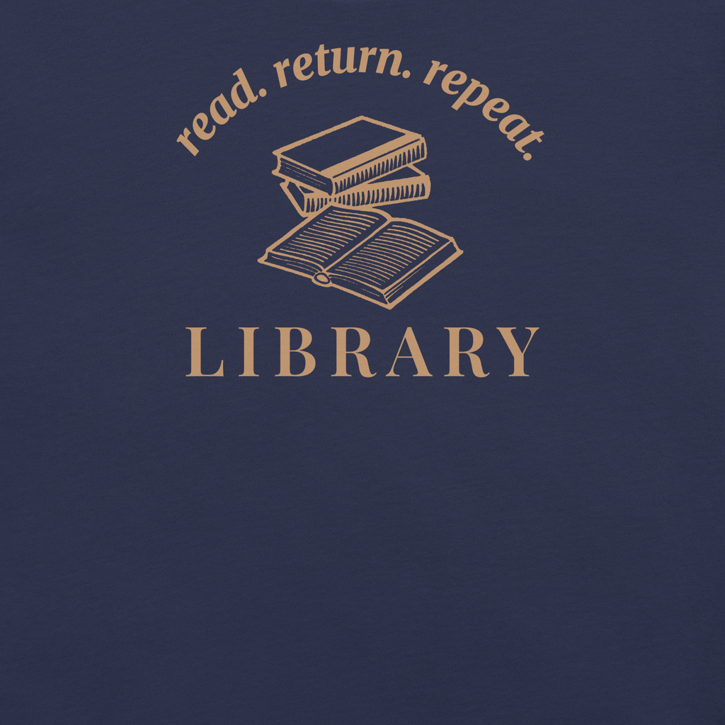 Library read return repeat badge style around books. Terra cotta ink on navy blue unisex Bella + Canvas cotton shirt. Closeup. 