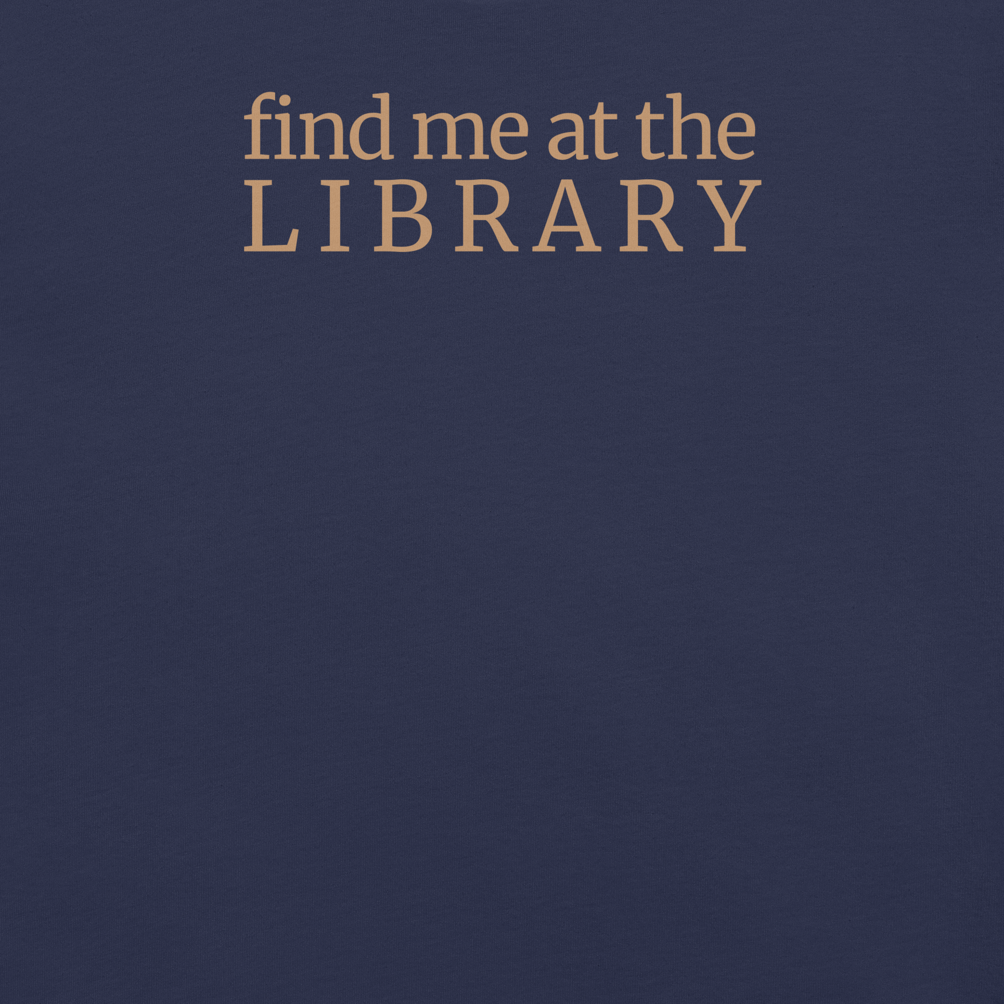 "Find Me at the Library" minimalist typography tee. On Bella + Canvas unisex cotton. Terra cotta ink on navy shirt. close up