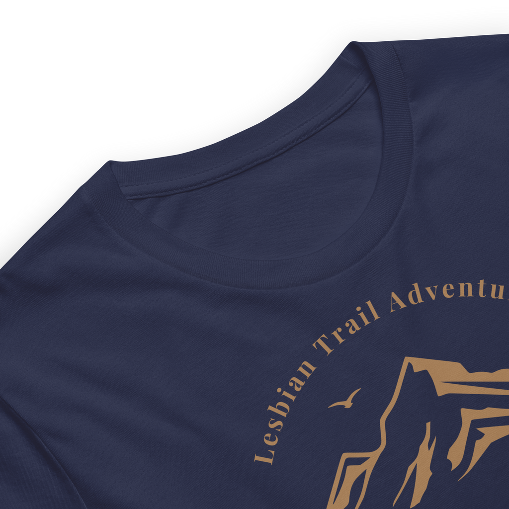Lesbian Trail Adventures minimal typography arc that crowns a mountain silhouette. Bella + Canvas unisex navy blue cotton.  closeup