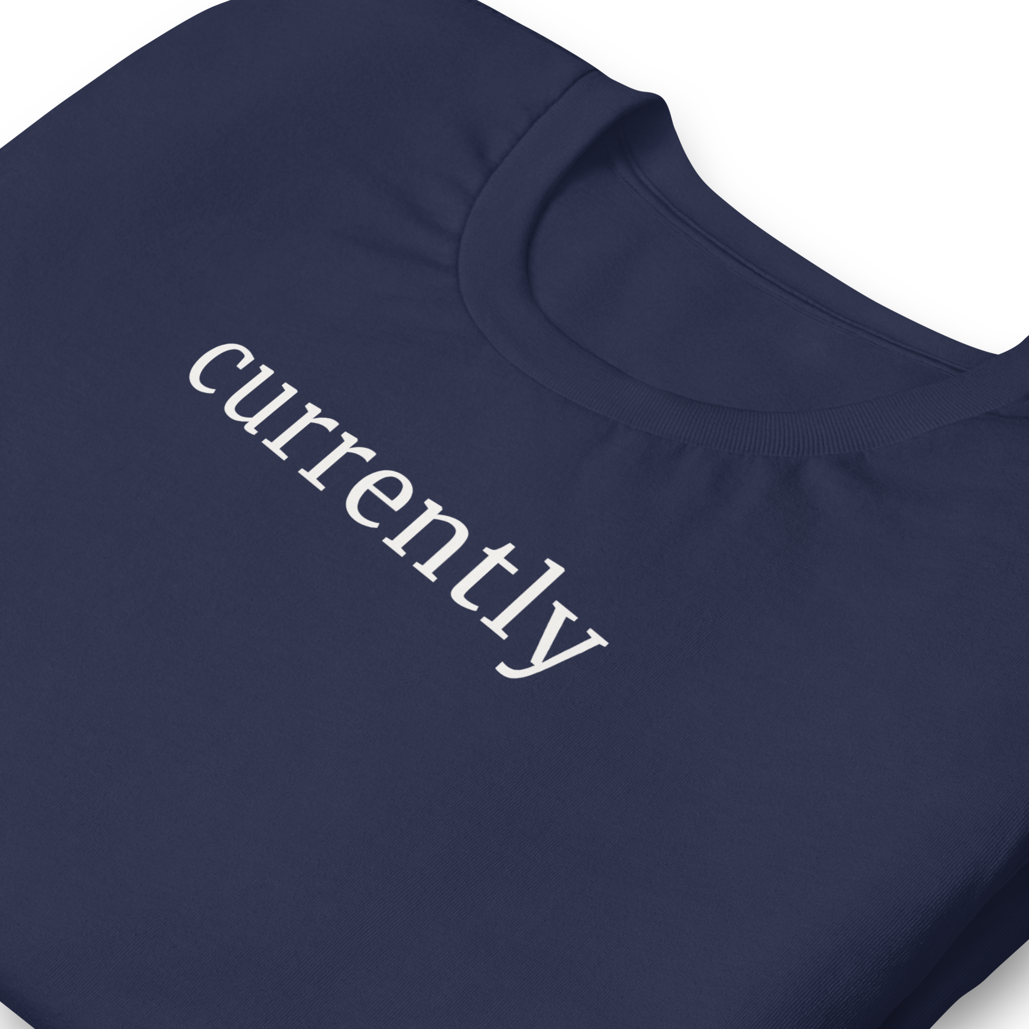 Currently in clean bold font, white ink, printed on Bella + Canvas cotton navy blue tshirt.  high Center chest, zoomed in