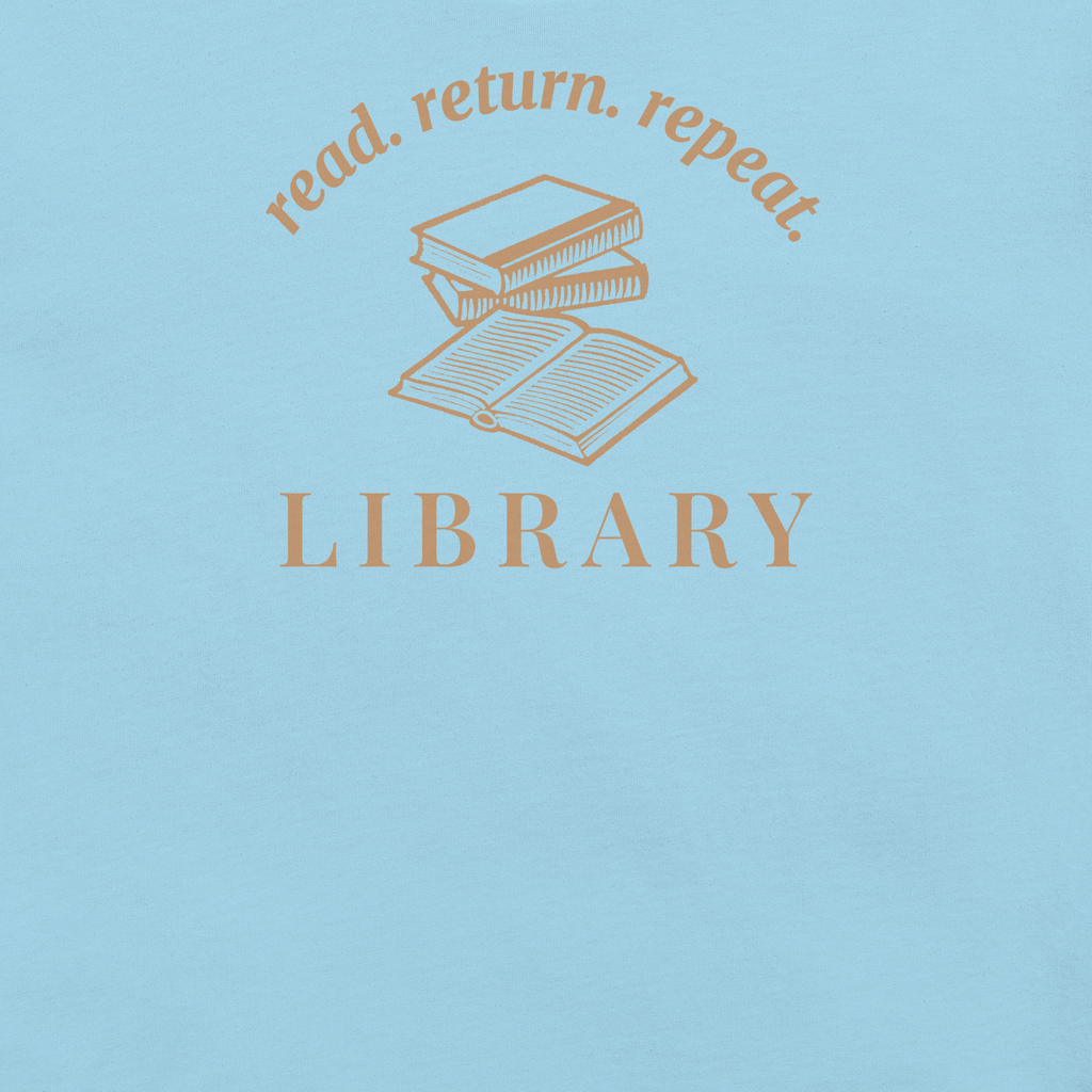 Library read return repeat badge style around books. Terra cotta ink on ocean blue unisex Bella + Canvas cotton shirt. Closeup. 