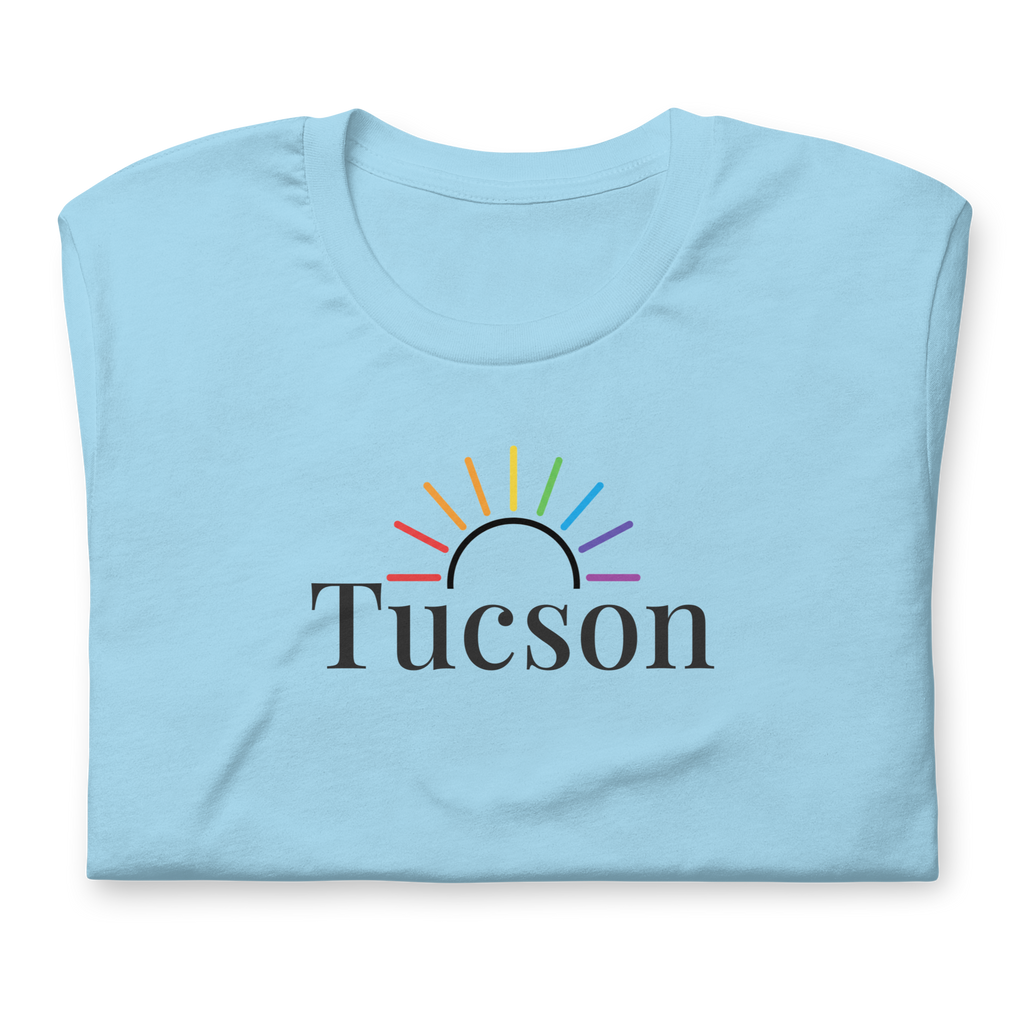 Tucson tee subtle rainbow sun arc. Premium Bella + Canvas unisex cotton for locals and travelers who love the desert vibe and everyday comfort. Ocean blue cotton. Center chest. close up