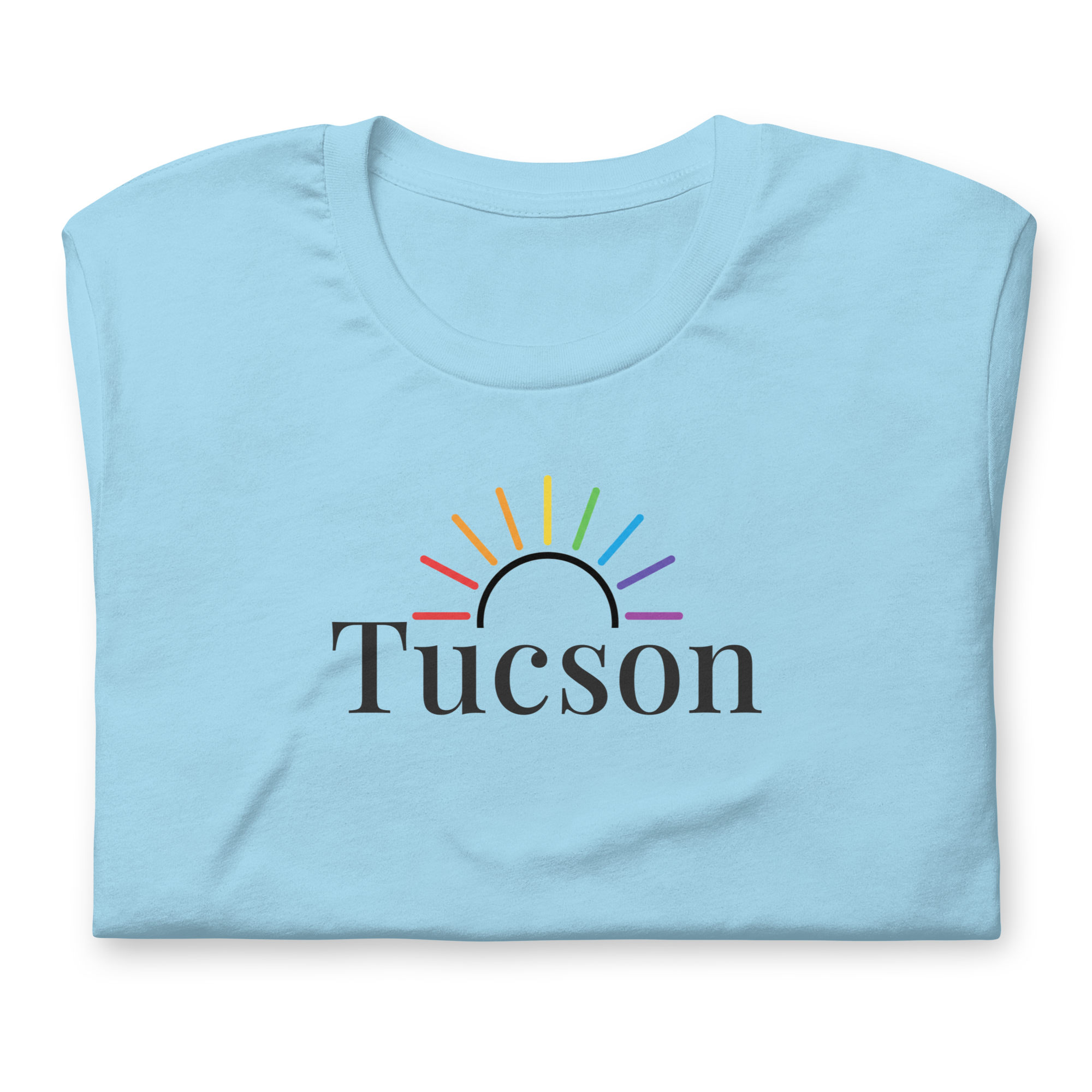 Tucson tee subtle rainbow sun arc. Premium Bella + Canvas unisex cotton for locals and travelers who love the desert vibe and everyday comfort. Ocean blue cotton. Center chest. close up