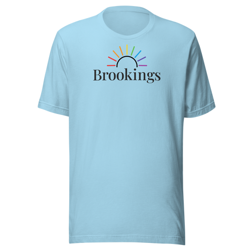 Brookings typography under rainbow sun arc on soft, unisex Bella + Canvas tshirt. Center Chest, ocean blue cotton