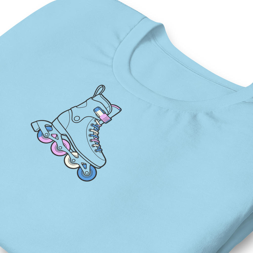 Close up of graphic and collar. High Center chest inline skate graphic. Minimalist line drawing outline with the laces and wheels in  trans Blue, pink, and white. Soft unisex Bella Canvas blue cotton. 