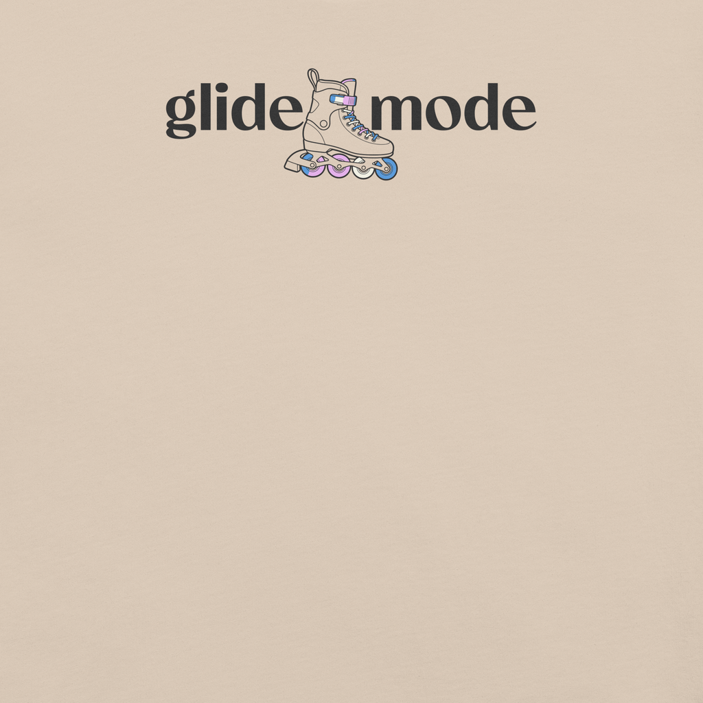 Coded LGBTQ+ glide mode typography shirt with minimal inline skate icon with white, pink, and blue accent. Unisex Bella + Canvas cotton. Close up.