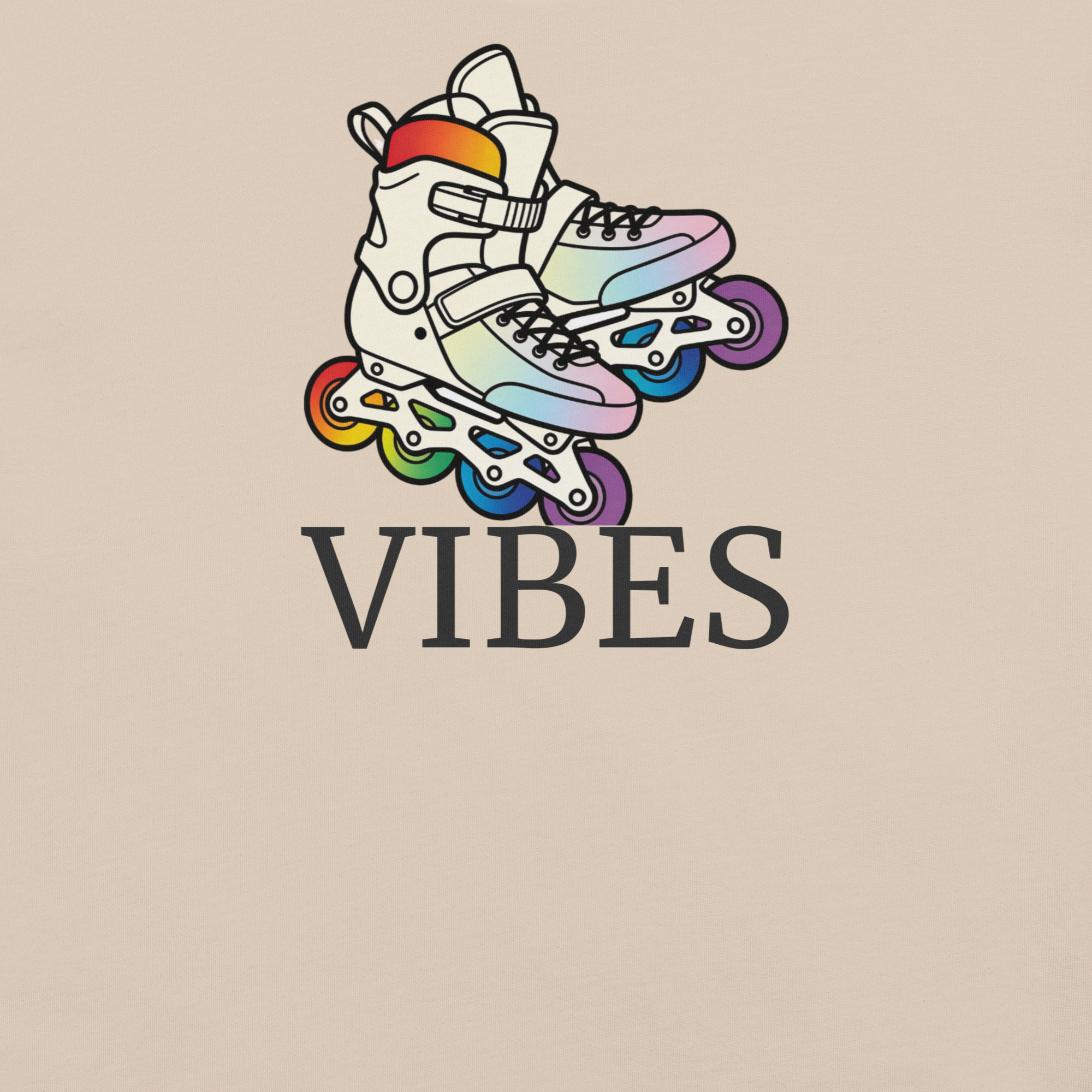 Close up of t-shirt of 2 inline skates in LGBTQ+ rainbow colors above VIBES text. Beige Bella + Canvas Cotton. 